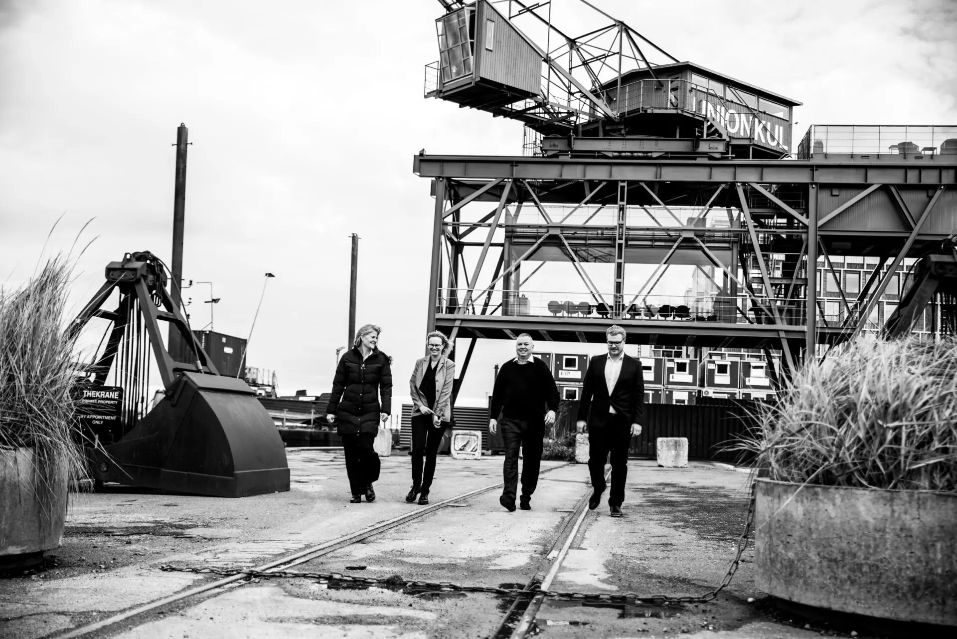 Team of IPR patent advisors sitting standing outside - Jesper Levin A/S